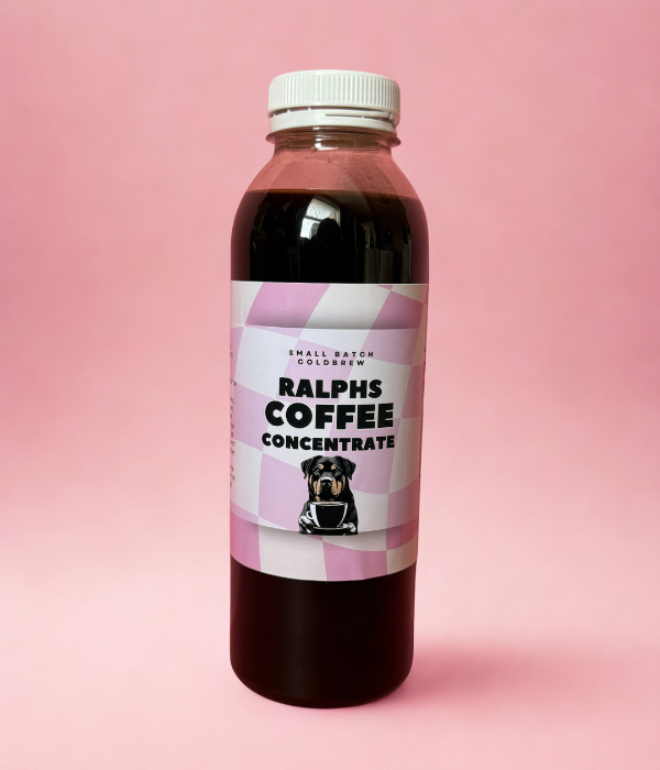 Bottle of Ralph's Coffee Concentrate on a pink background